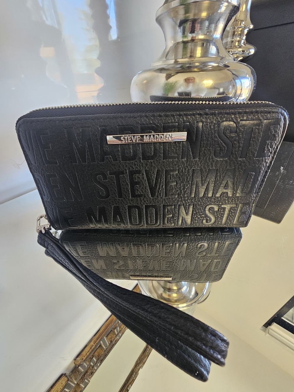 Steve Madden Black Embossed Logo Wristlet